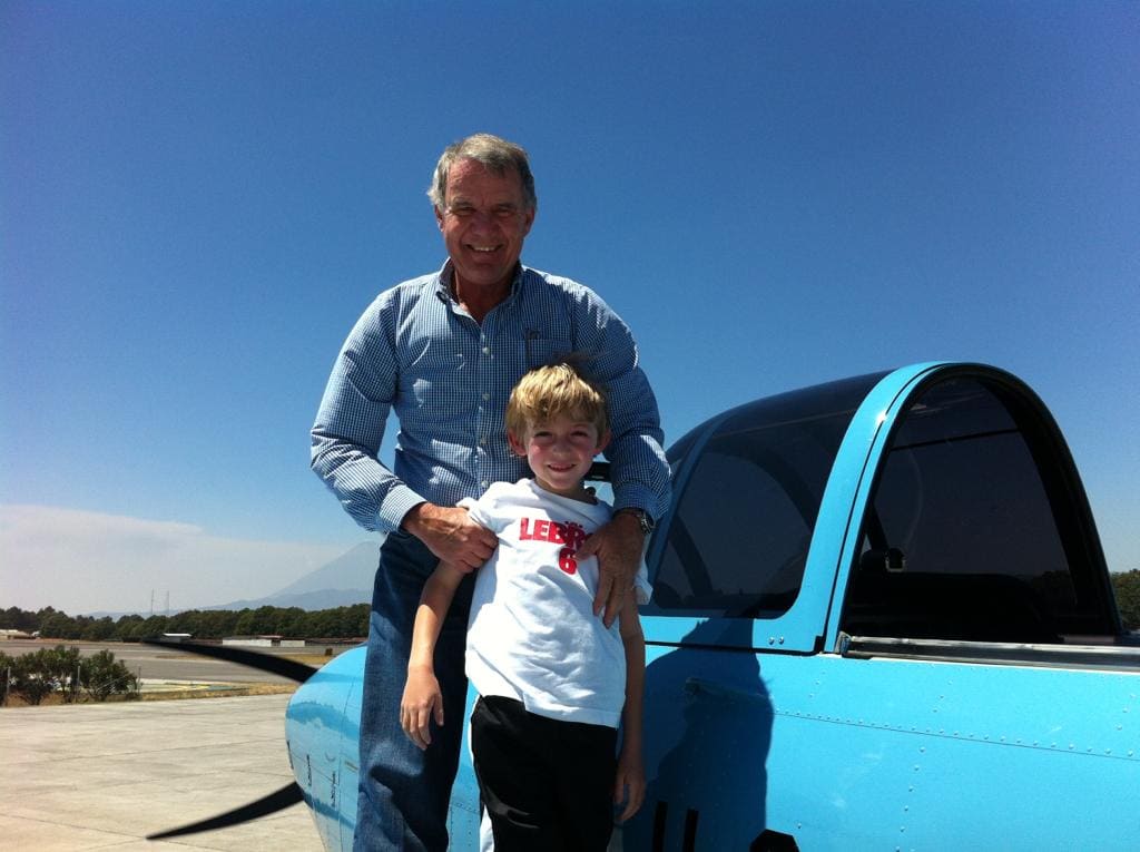 Jean Maxime Morel with Diego Fernández Morel, next to an aircraft.